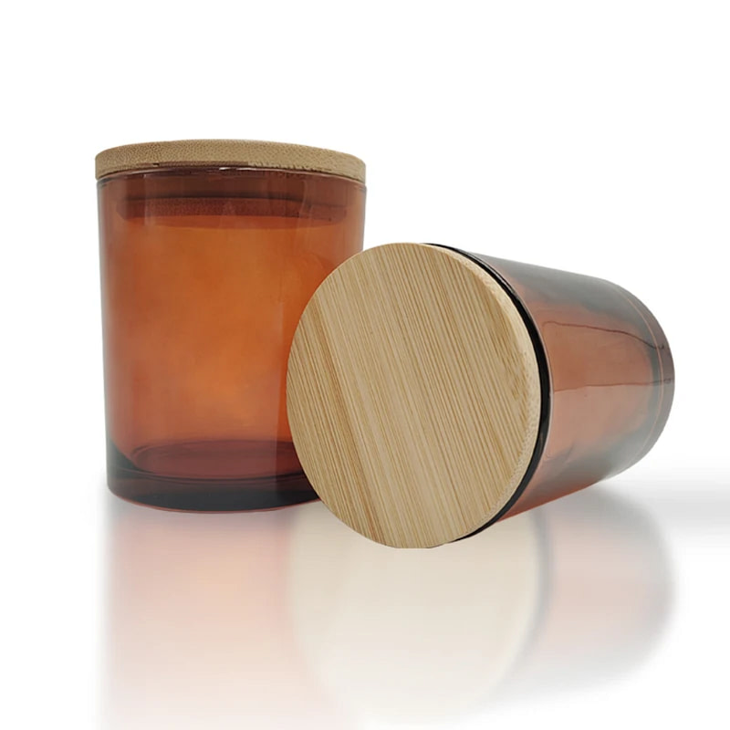 two glass jars with wooden lids sit next to each other