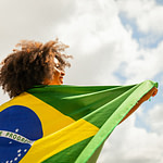 woman holding flag - brazil flag