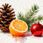 pinecone with green pine needles next to a juicy orange and a christmas decoration