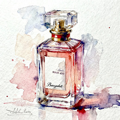 A fancy red perfume bottle with a white label