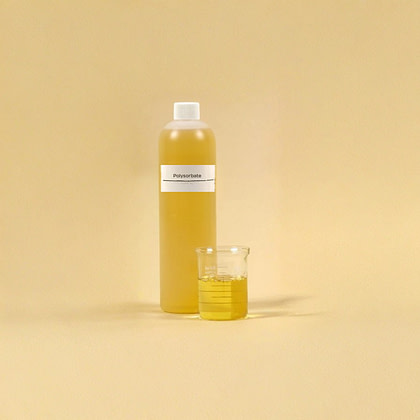 Bottle of yellow liquid