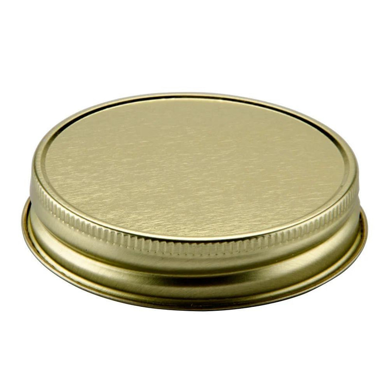 a round metal lid on a white background