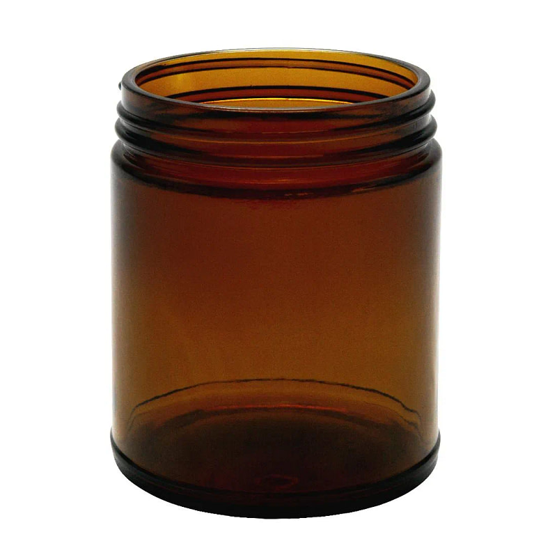 a brown glass jar on a white background