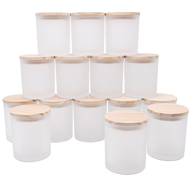 a stack of six clear glass jars with wooden lids