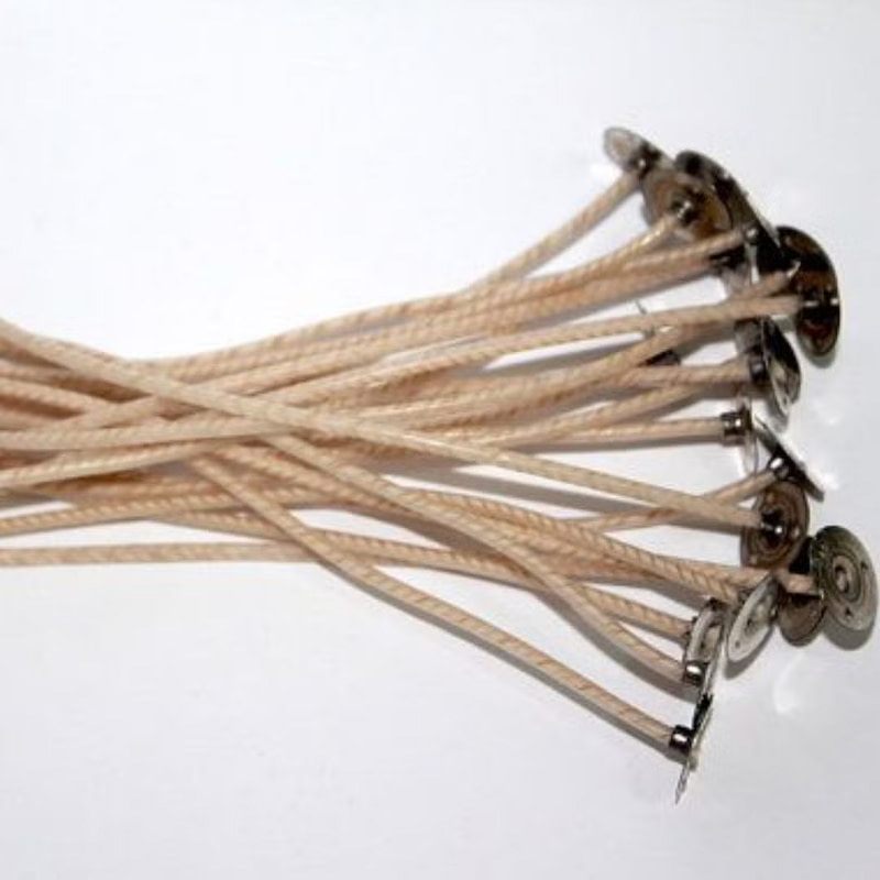 a bunch of beige cord with metal buttons