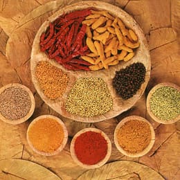 Colored spices in containers